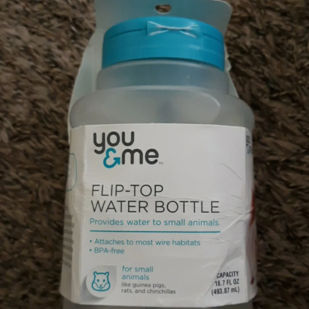 #310NWT You&Me flip top water bottle. Size: 16.7 fl oz
